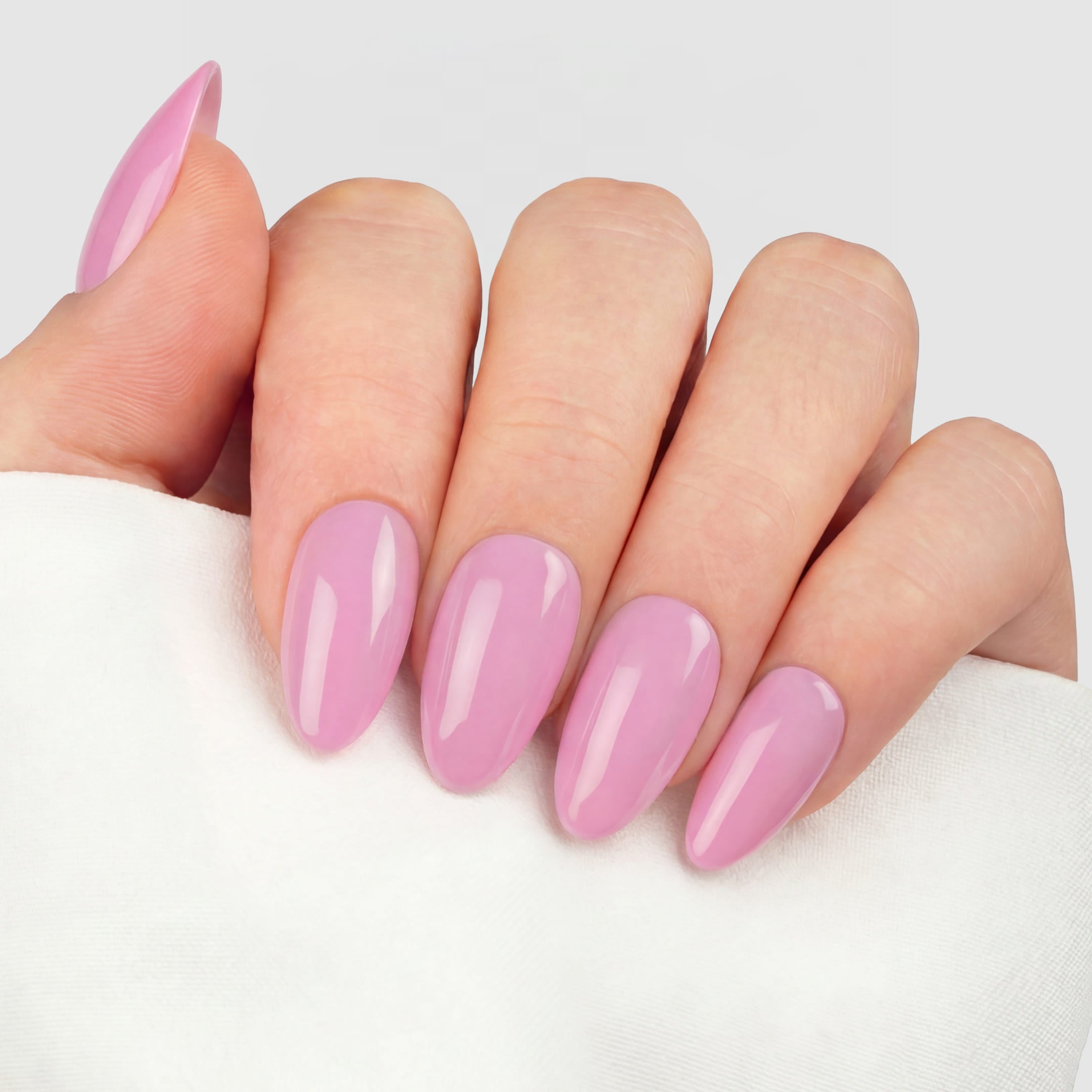 Barbie Almond press-on lösnaglar i almondform med intensiv rosa nyans och spegelblank finish