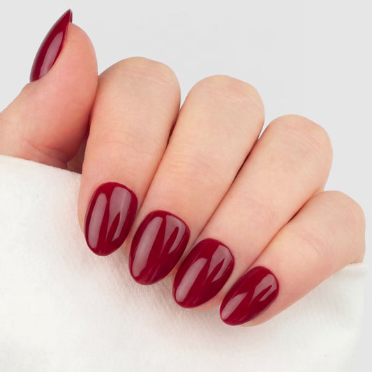 Bordeaux Almond Short press-on lösnaglar i kort almondform med djup vinröd nyans och glansig finish