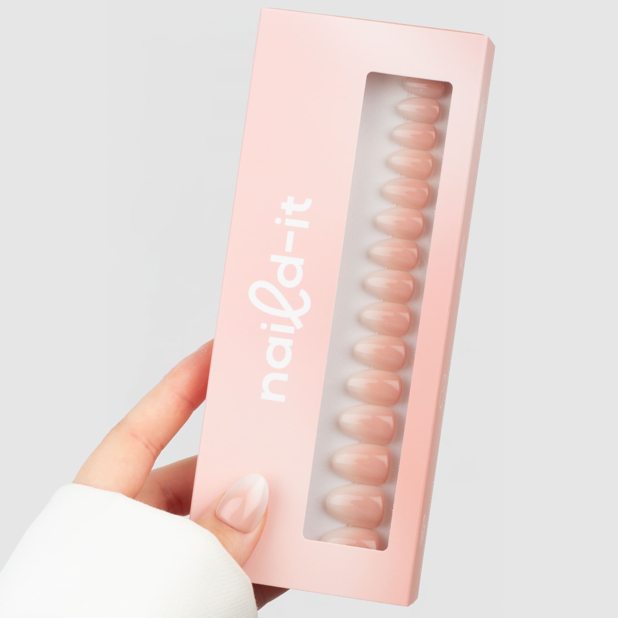 French Ombre Almond Short press-on lösnaglar i kort almondform med mjuk ombre-effekt från nude till vitt