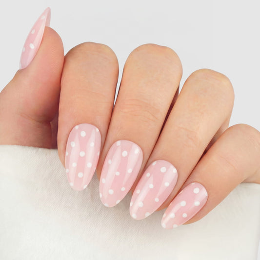 Rosa prickiga press-on naglar i almond-form med glansig finish.