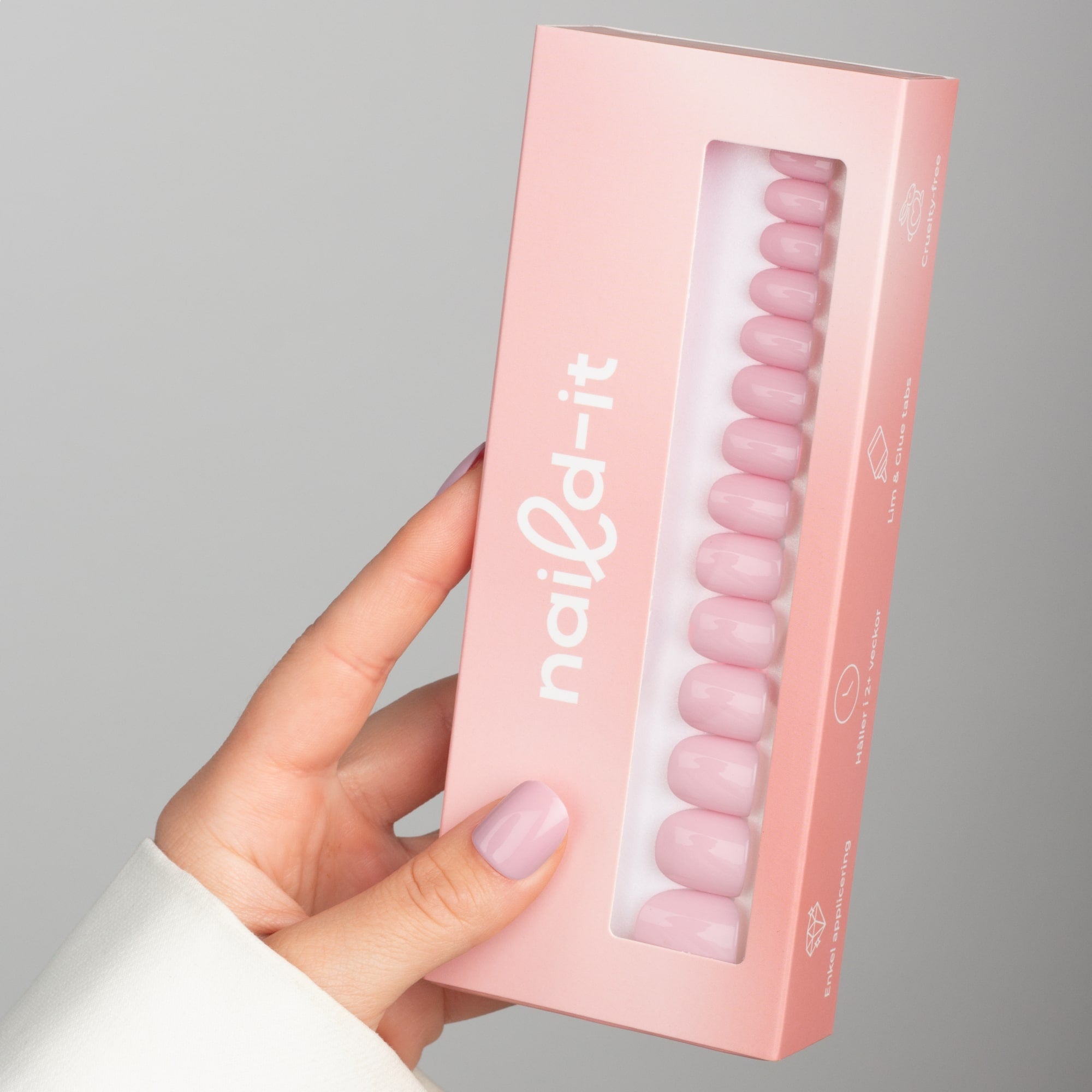 Rose Petal Squoval Short press-on lösnaglar i kort squovalform med mjuk rosanyans och glansig finish