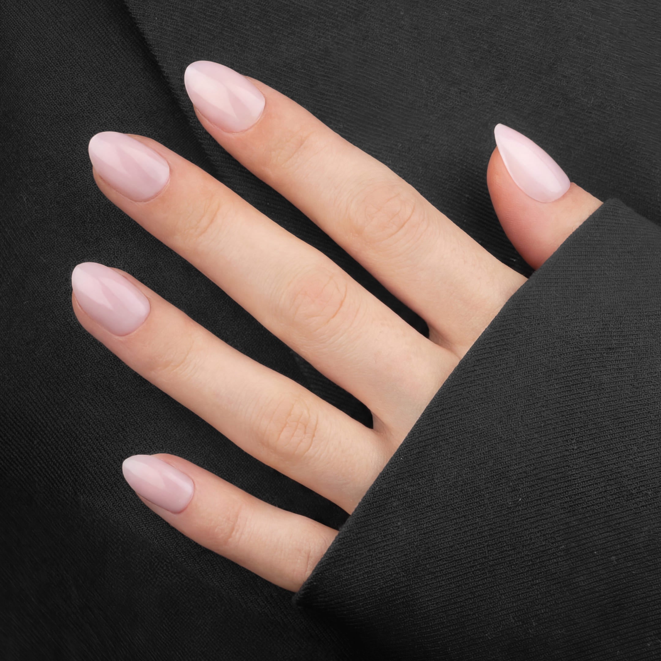 Soft Pink Almond Short press-on lösnaglar i kort almondform med mjuk rosa nyans och naturlig finish