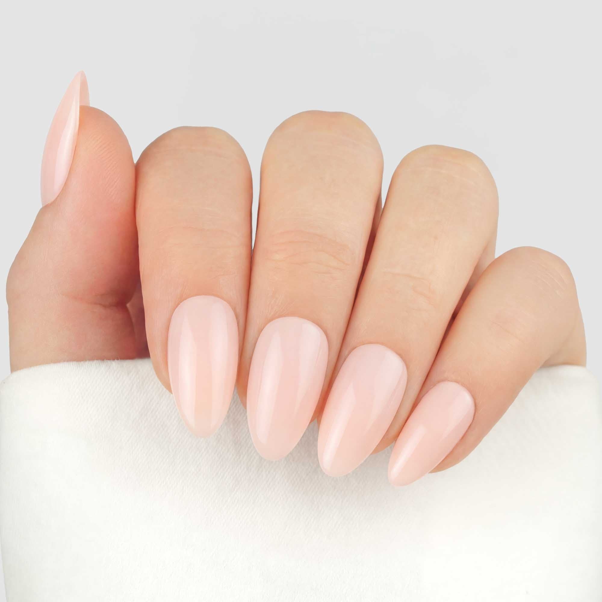 Ballet Blush Almond press-on lösnaglar i almondform med mjuk nude-rosa nyans och glansig finish