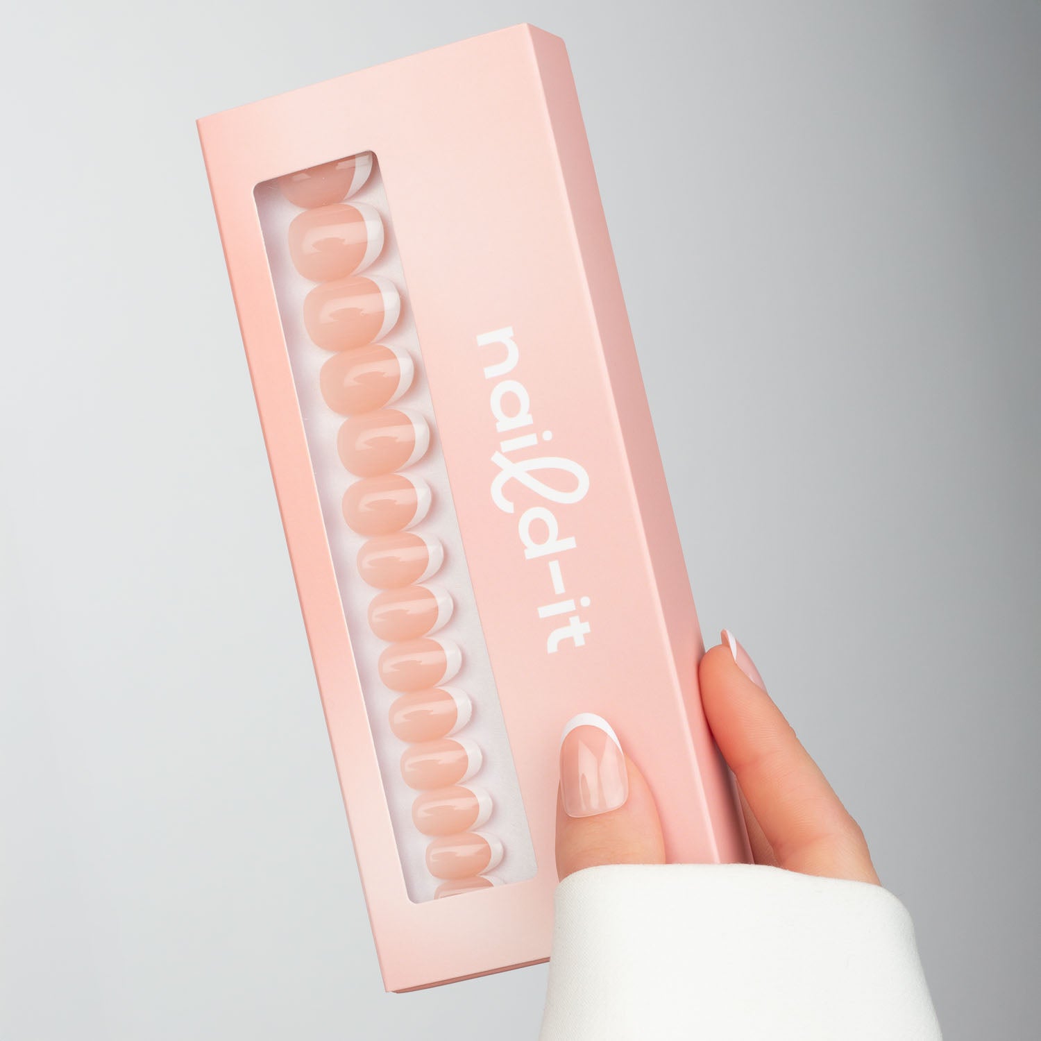 French Tip Oval press-on lösnaglar i ovalform med vit fransk tipp och naturlig bas